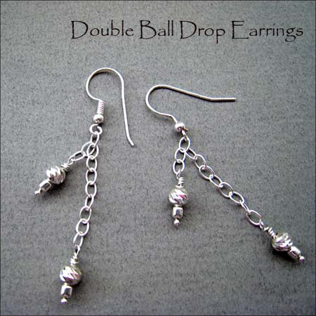 E - Double Ball Drop Earrings