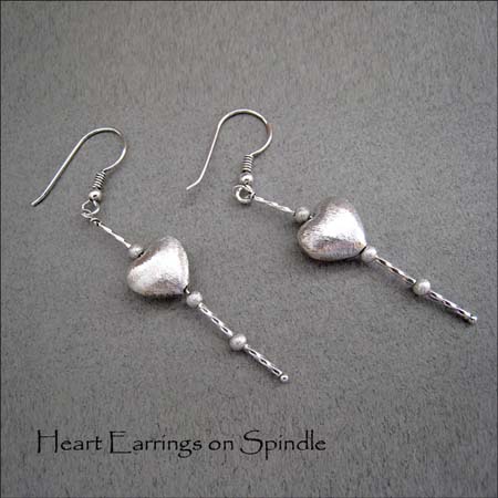 E - Heart Earrings on Spindle