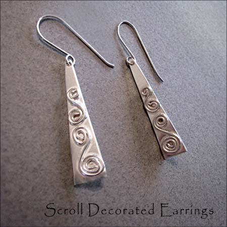 E - Scroll Decorated Earrings